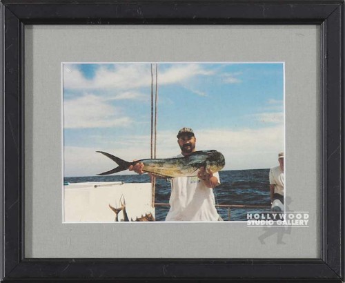 9X11 TABLETOP GUY HOLDING LONG FISH