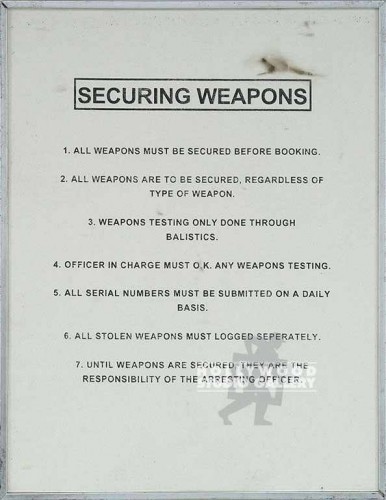 11x9 Securing Weapons Sign