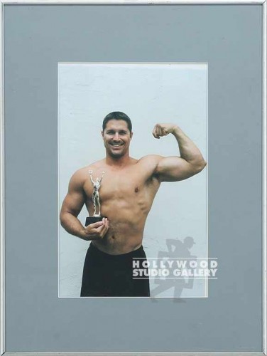24X18 BODY BUILDER HOLDING TROPHY