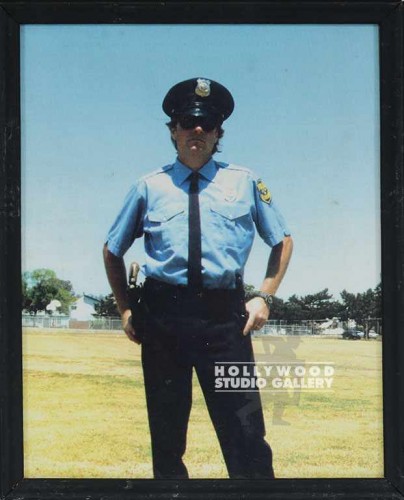 10X8 OFFICER STANDING IN FIELD