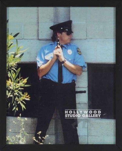 8X10 VERT/MALE COP W/GUN