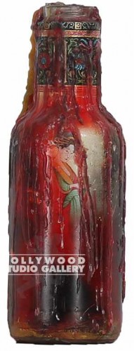 9" WAX CANDLE STUCK IN A BOTTLE