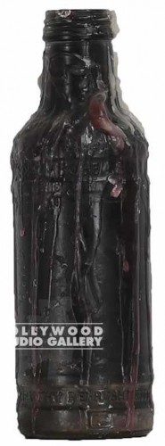 9" WAX CANDLE STUCK IN A BOTTLE